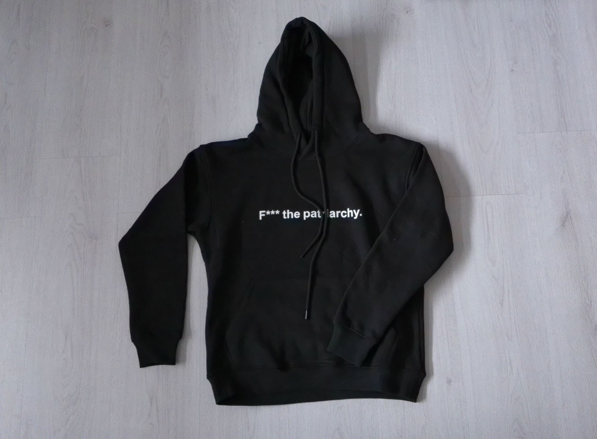 black 100% cotton hoodie with white text